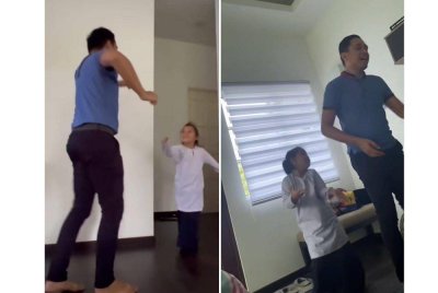Klip tular di media sosial, Adya Naurah (kanan) dan bapanya, Muhammad Amin yang menari dan menyanyi bersama selepas pulang dari sekolah.