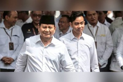 Gibran (kanan) pernah digelar sebagai 'baby nepotisme' kerana menggunakan pengaruh bapanya untuk bertanding jawatan Cawapres. Foto Agensi