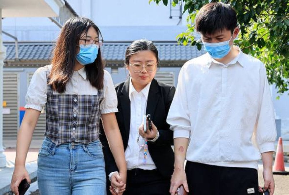 Xu Jianfeng, 27, dan isterinya Shi Qian, 28, ketika hadir di ]Mahkamah Sesyen Sepang pada Jumaat.