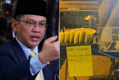 Mohd Na'im (kiri), Tangkap layar video tular mengenai tindakan seorang penjaja meletakkan notis berunsur perkauman di mejanya.