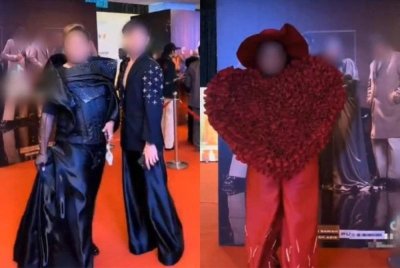 Penonton lelaki dilihat berpakaian seumpama wanita sewaktu menghadiri Anugerah Juara Lagu ke-39 yang disiarkan secara langsung Ahad lepas.