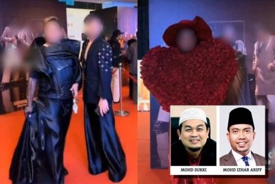 Penonton lelaki dilihat berpakaian seumpama wanita sewaktu menghadiri Anugerah Juara Lagu ke-39 yang disiarkan secara langsung Ahad lepas.