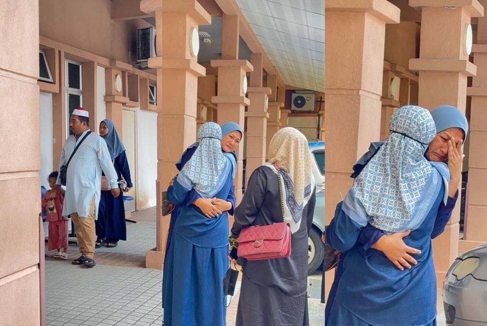 Mohamad Fakhruddin dan Nuraini bersama anak kedua mereka dilihat masuk ke bilik mayat Islam di Jabatan Perubatan Forensik HPP.