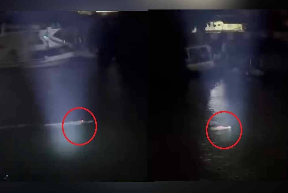 Tangkap layar kelibat buaya berenang dipercayai di jambatan Marang