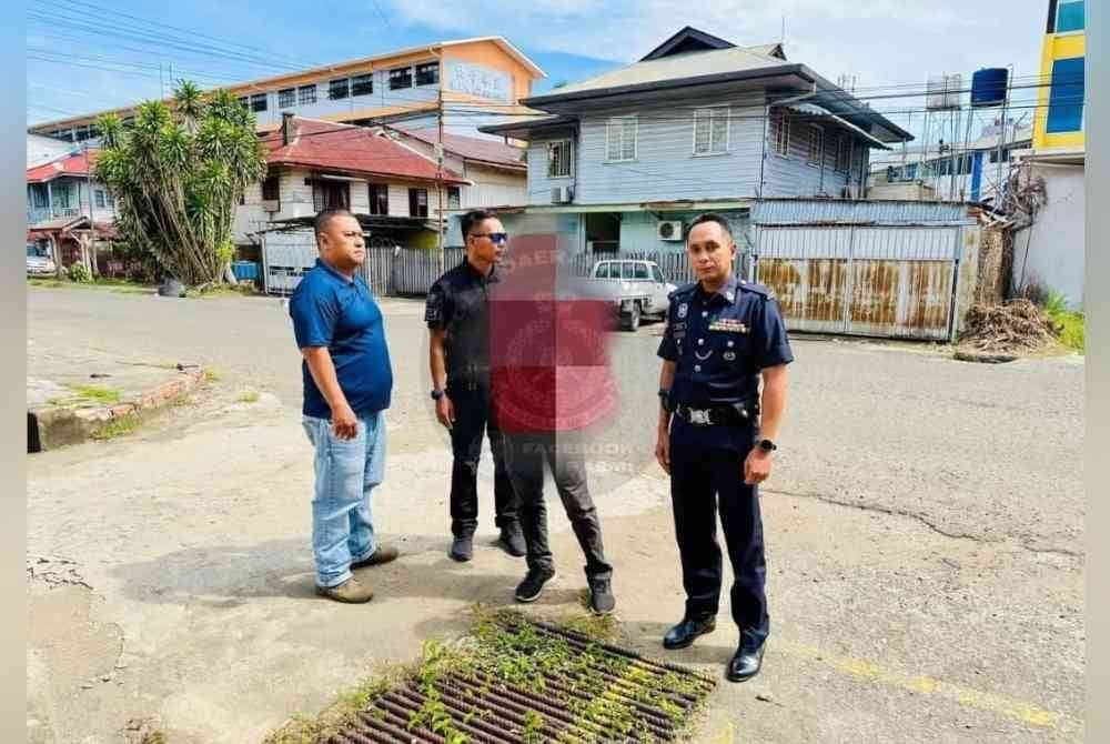 Suspek ditahan polis kerana bertindak mencederakan anak dan mengugut isterinya dalam kejadian di sebuah taman perumahan di Tawau.