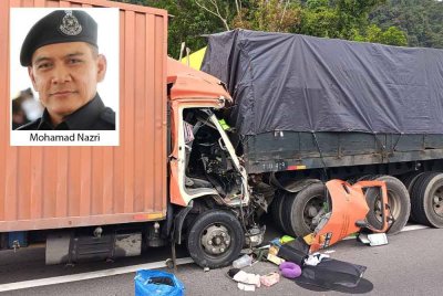 Nahas membabitkan dua lori di KM300.8 pada Jumaat menyebabkan seorang mangsa maut di tempat kejadian. - Foto: PDRM