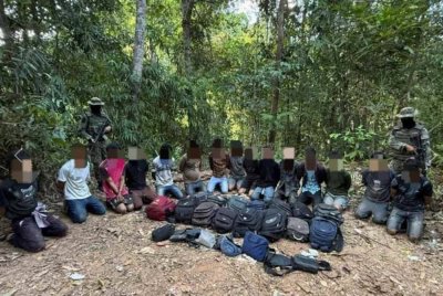 TDM menahan 29 pendatang asing tanpa izin warga Myanmar di daerah Kubang Pasu pada Khamis. Foto TDM