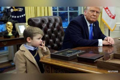 Aksi X ketika berada di Pejabat Oval. - Agensi