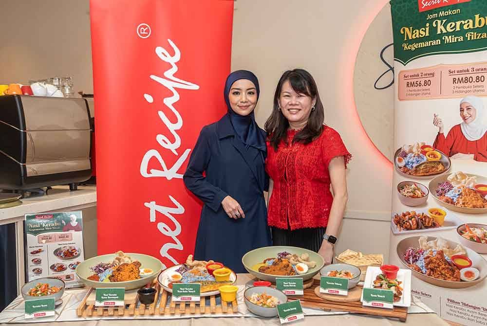Mira Filzah bersama Evelyn dalam Majlis Pelancaran Jom Makan Nasi Kerabu Kegemaran Mira Filzah.
