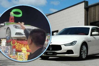 Lelaki bernama Wang berjaya membawa pulang hadiah sebuah kereta mewah Maserati bernilai lebih RM1 juta selepas bermain lontar gelung di sebuah pasar malam di China. Foto Agensi