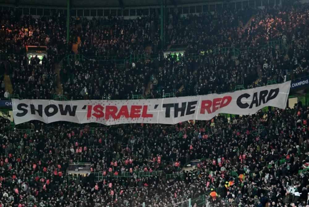 Kempen digerakkan ultras Green Brigade dari Celtic FC mendapat perhatian dunia. Foto AFP