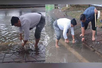 Mohd Fauzi yang dalam perjalanan pulang dari Wisma Majlis Bandaraya Shah Alam (MBSA) turun dari kenderaan dan mengambil tindakan membersihkan parit erong yang tersumbat