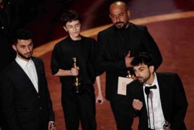 Basel Adra, Rachel Szor, Hamdan Ballal dan Yuval Abraham memenangi Oscar untuk Filem Dokumentari Terbaik untuk "No Other Land". - Gambar/ Reuters