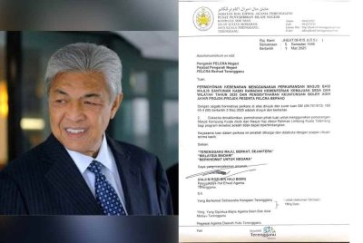 Surat rasmi JHEAT yang diedarkan pada Jumaat berhubung penolakan permohonan menggunakan pekarangan masjid bagi program bersama TPM pada Sabtu. Ahmad Zahid (kiri).