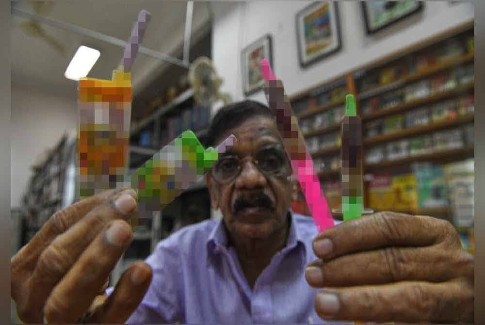 Subbarow menunjukkan salah satu gula-gula berbentuk peranti dan jarum suntikan yang menjadi trend ketika ini dalam kalangan kanak-kanak.