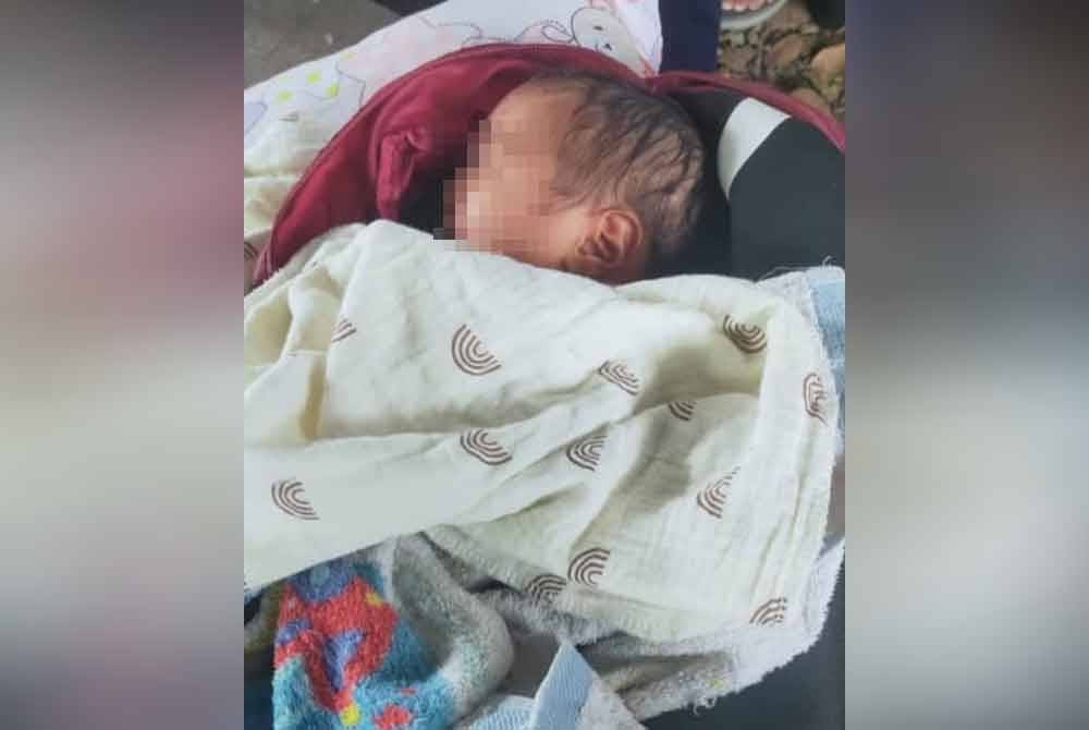 Seorang bayi perempuan yang ditemui dekat bangsal kayu di Taman Semarak Sungai Petani pada Ahad.