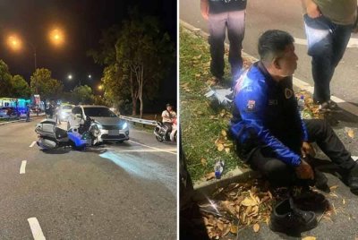 Seorang anggota polis trafik cedera selepas terbabit dalam kemalangan semasa mengiringi kenderaan Yang Dipertua Negeri Melaka. Foto IPD Alor Gajah