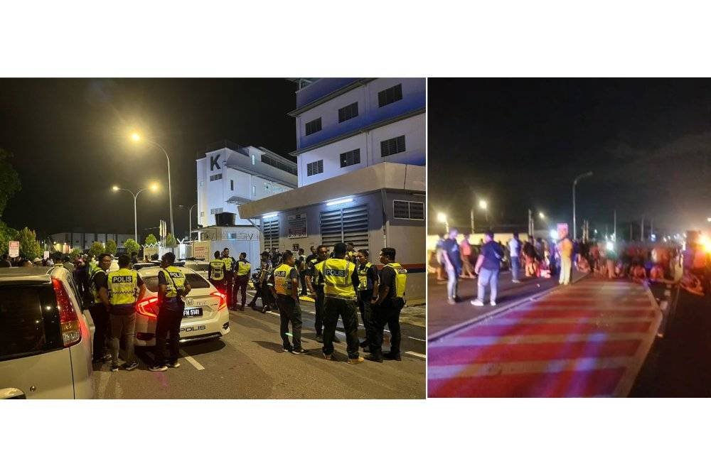Polis mengambil masa lebih empat jam bagi menyuraikan himpunan pekerja kilang warga Nepal yang telah menghalang lalu lintas di Jalan Changkat Jong, Teluk Intan pada Jumaat. Foto ihsan polis