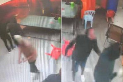 Tangkap layar dipercayai rakaman CCTV di lokasi kejadian memaparkan kejadian yang mengakibatkan dua lelaki maut ditetak dalam pergaduhan di sebuah premis perniagaan di Taman Sentosa pada Sabtu.