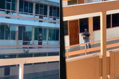 Tangkap layar video tular memperlihatkan lelaki bertopeng dan bersenjata dalam keadaan mencurigakan berada dalam kawasan politeknik.