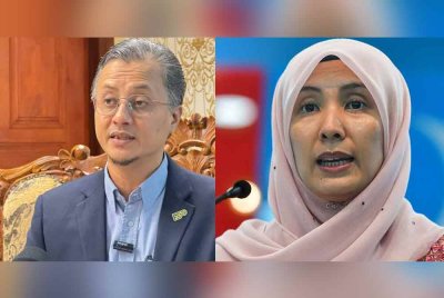 Mohamad (kiri), Nurul Izzah. Foto Bernama