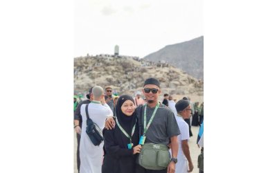 Muhammad Faizal bersama isteri sentiasa menghargai peluang usaha Grab Malaysia membawa rakan-rakan pemandu mereka menunaikan ibadah umrah.
