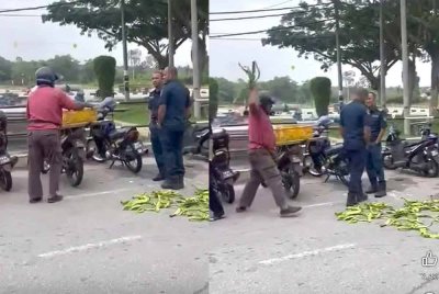 Tangkap layar video tular menunjukkan seorang lelaki membuang petai yang dijualnya di atas jalan.