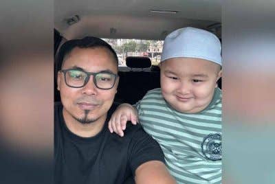 Mohd Redzuan dan anaknya, Bang Aji.