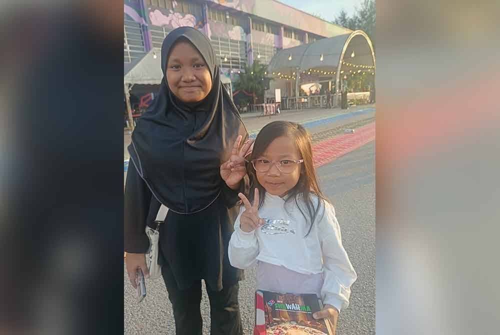 Nur Aisyah (kiri) dan adiknya, Nur Aafiya Aqilah (kanan) sentiasa teruja untuk menyertai Program Iftar Ala Madinah @ Karangkraf.