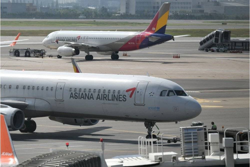 Penerbangan Asiana Airlines OZ708 dari Filipina ke Incheon ditangguhkan lebih 15 jam selepas juruterbang kehilangan pasport. Foto fail AFP