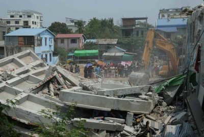 Gempa bumi kuat magnitud 7.7 yang melanda Myanmar, mengorbankan 1,644 orang, mencederakan 3,408, dan 139 masih hilang. Foto Xinhua