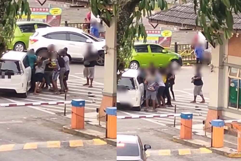 Tangkap layar video tular menunjukkan pergaduhan yang berlaku di hadapan sebuah pangsapuri di bandar raya Johor Bahru.