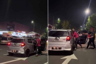 Lelaki tersebut dipercayai bapa kepada kanak-kanak itu gagal mengawal kemarahan bertindak menyerang pemandu wanita berkenaan