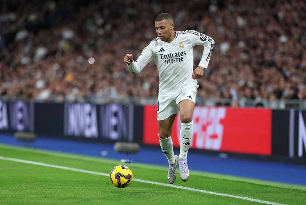 Kylian Mbappe berpotensi menjadi legenda di Santiago Bernabéu seperti bekas bintang pasukan itu, Cristiano Ronaldo. - Foto: AFP