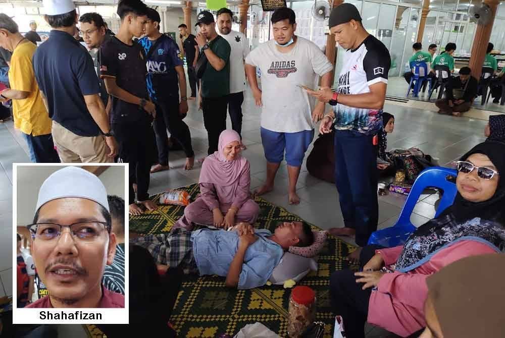 Antara kekuarga pesakit yang mendapatkan rawatan dan ditempatkan di Masjid Nurul Iman, Kampung Tengah. Gambar kecil: Shahafizan