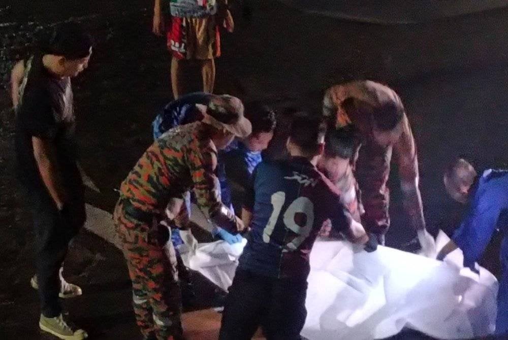 Mayat kanak-kanak ditemui di Pulau Berhala, Sandakan sebelum diserahkan kepada pihak bomba.