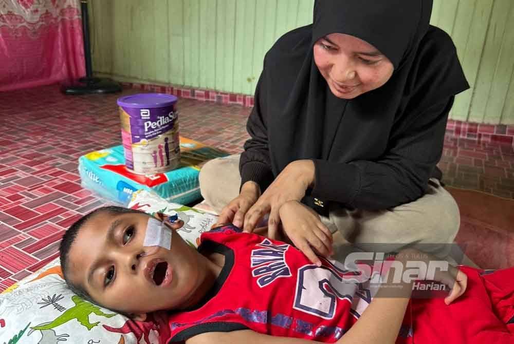 Muhamad Iman Hafiz terlantar selepas terkena serangan sawan ketika masih bayi. FOTO SINAR HARIAN-ADILA SHARINNI WAHID