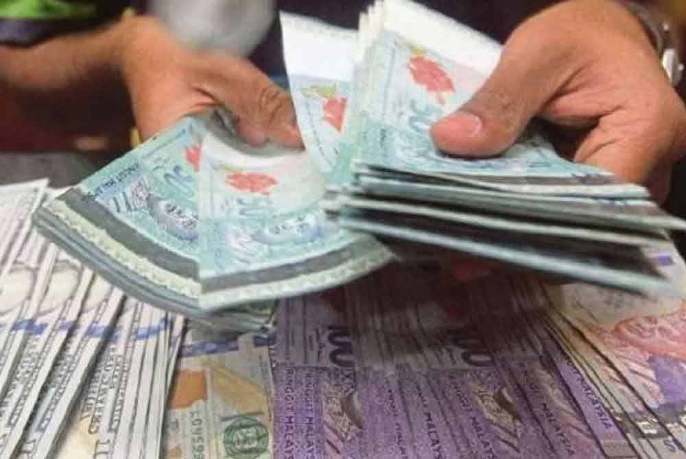 Ringgit ditutup kukuh berbanding dolar AS ditengah-tengah ketidaktentuan tarif AS. Gambar hiasan