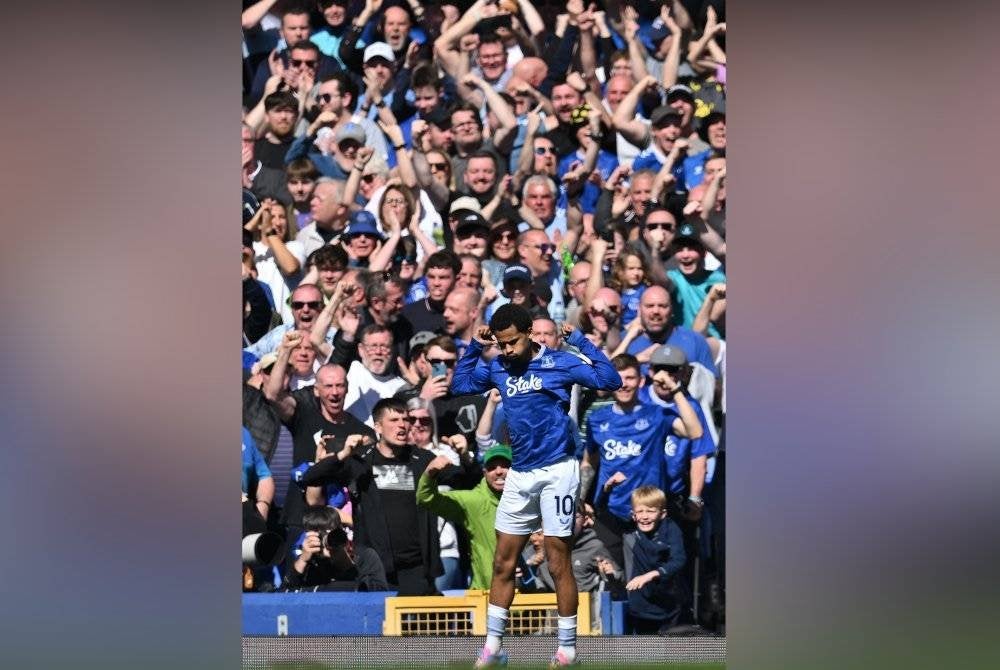 Ndiaye meraikan jaringan penyamaan Everton ketika mengikat Arsenal dalam aksi liga di Goodison Park. Foto AFP