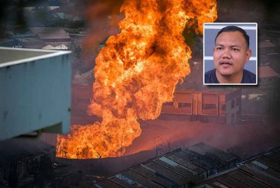 Situasi terkini sekitar laluan menghala ke lokasi kebakaran saluran paip gas di Taman Puchong Perdana, Puchong. Gambar kecil: Muhammad Faizal Hamzah