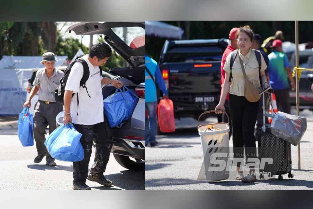 Mangsa kejadian kebakaran dan letupan paip gas di kawasan Putra Heights dibenarkan masuk ke rumah selama 40 minit bagi mengambil barang keperluan mereka. Foto SINAR HARIAN- ROSLI TALIB