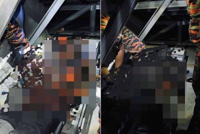 Pasukan bomba melakukan kerja-kerja menyelamat dengan membawa turun mangsa dalam kejadian di Chemor, Ipoh pada Ahad. Foto Ihsan Bomba Perak