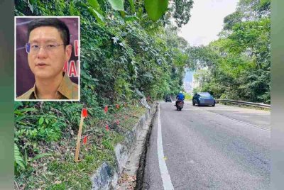 Pemasangan 'robe light' dibuat di kawasan sekitar lokasi kejadian dan yang berisiko berlaku bongkah batu menggelongsor di Jalan Paya Terubong. Gambar kecil: Zairil