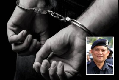 Polis menahan seorang lelaki yang disyaki menceroboh kawasan Kompeni C, Batalion Kedua Rejimen 503 Askar Wataniah di Gerik pada Selasa. Gambar hiasan (Gambar kecil: Zulkifli)