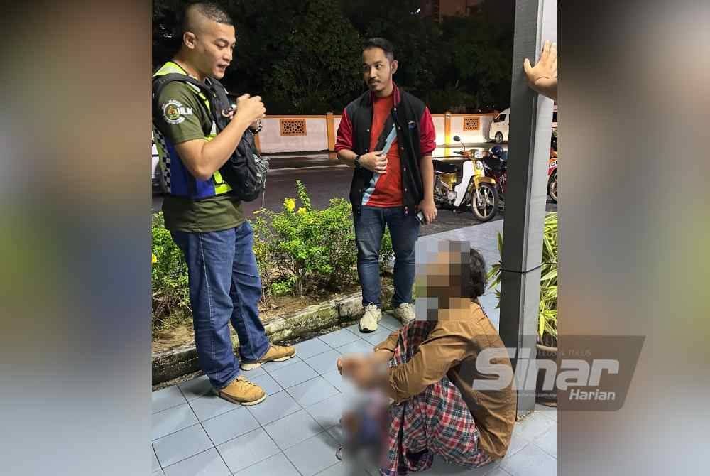 Lelaki Rohingya (kanan) yang ditahan kerana menunggang motosikal tanpa sebarang dokumen. FOTO SINAR HARIAN-ADILA SHARINNI WAHID