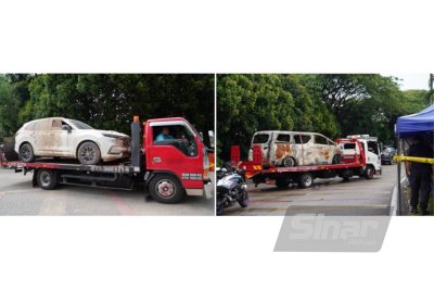 Antara kenderaan milik mangsa di Taman Putra Harmoni, Subang Jaya yang terjejas dibawa keluar menggunakan trak penunda pada Rabu. Foto SINAR HARIAN-ROSLI TALIB