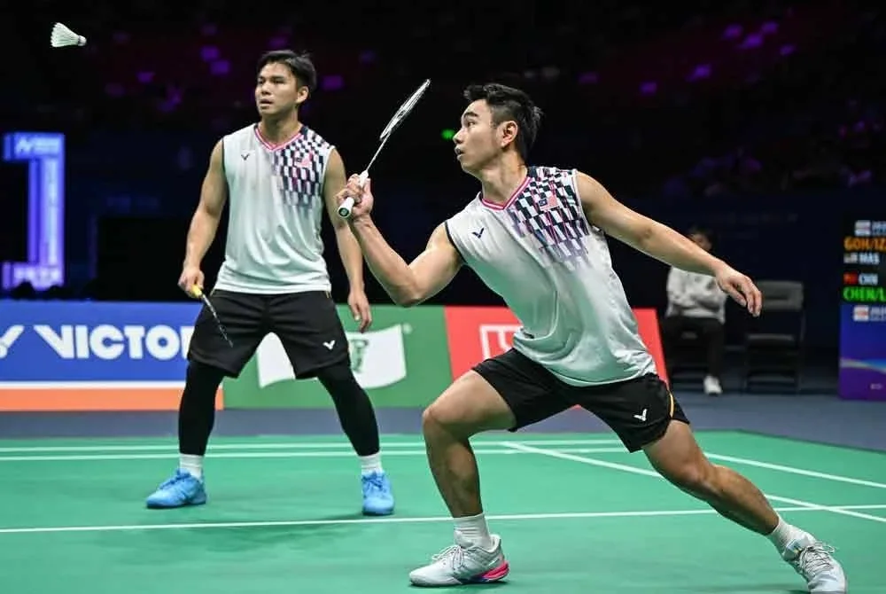 Cabaran Sze Fei (kanan) - Nur Izzuddin di BAC terkandas di suku akhir. - Foto: AFP