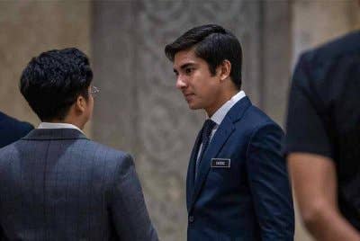 Ahli Parlimen Muar Syed Saddiq Syed Abdul Rahman (tengah) hadir di Istana Kehakiman pagi ini untuk pendengaran rayuan hari ketiga terhadap sabitan dan hukuman bagi empat pertuduhan pecah amanah, salah guna harta dan pengubahan wang haram dana Armada yang membabitkan beliau. Foto Bernama