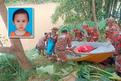 Kawasan pencarian diperluaskan dengan menyusuri kira-kira 21 kilometer bermula dari muara Sungai Tuaran menggunakan bot penyelamat. Gambar kecil, Muhammad Aniq Faiz.