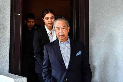 Bekas Perdana Menteri, Tan Sri Muhyiddin Yassin tiba di Kompleks Mahkamah Kuala Lumpur pada Jumaat. Foto Bernama